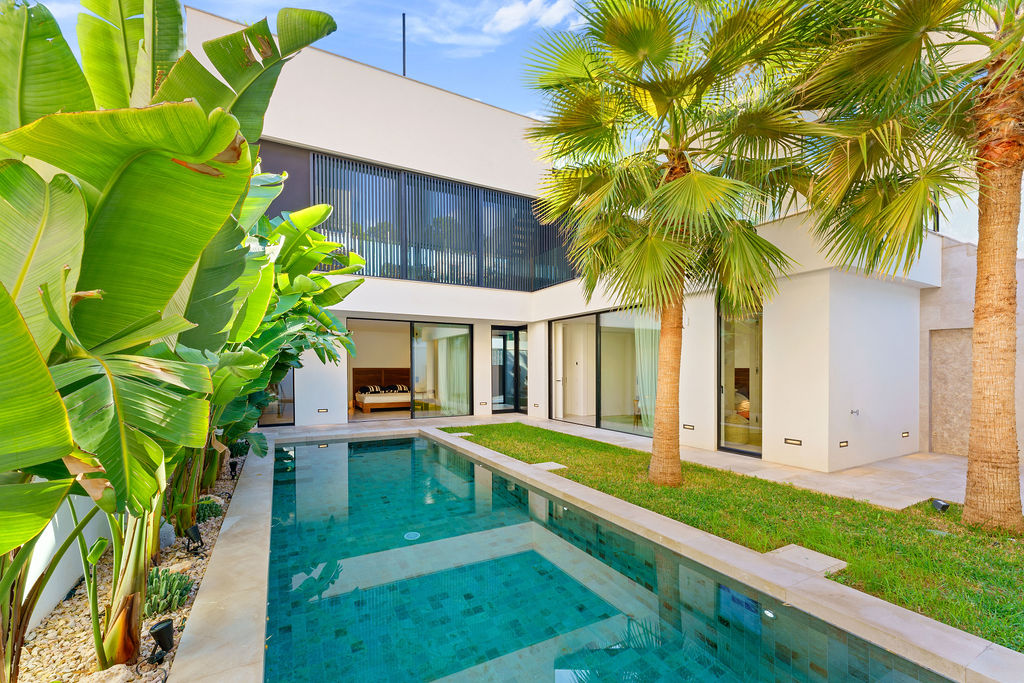 Infinity pool at an elevated sea view villa in Palma de Mallorca, offering stunning views of the ocean and a serene, luxurious atmosphere.