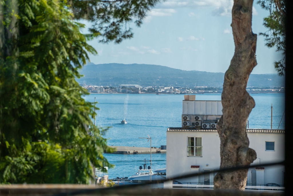 Breathtaking sea view from an elevated villa in Palma de Mallorca, showcasing expansive ocean vistas and a tranquil, luxurious setting.